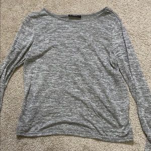 Gray long sleeve shirt with opening in the back